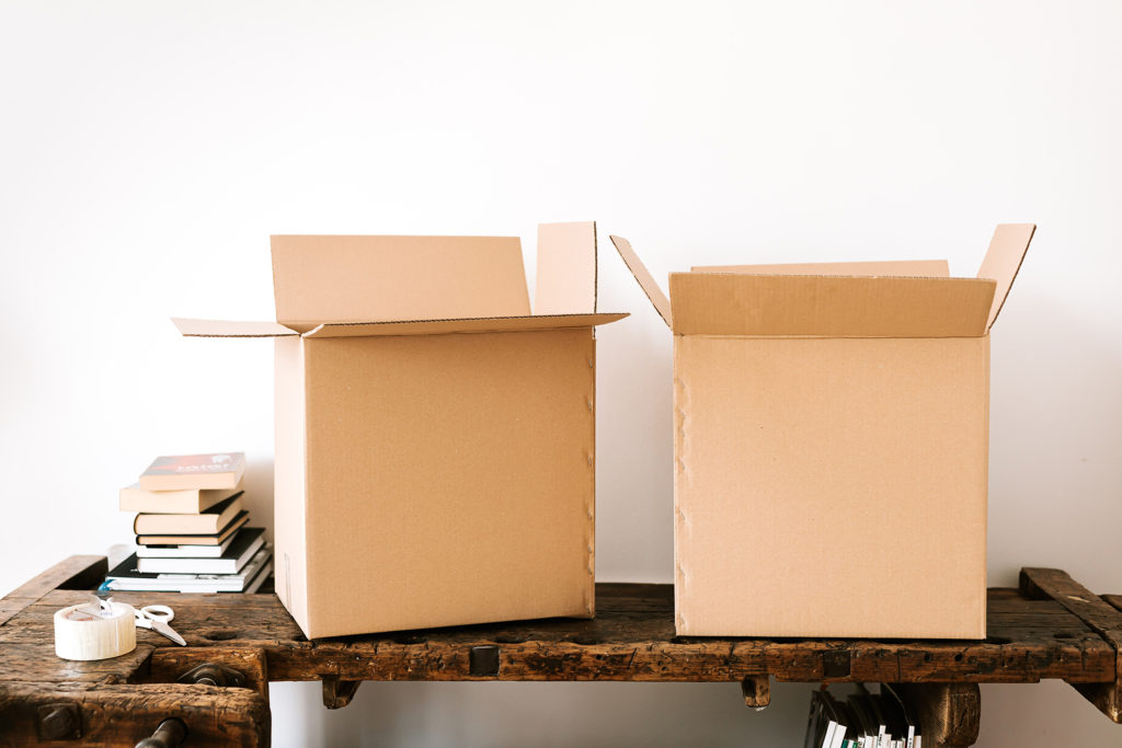 moving boxes on table